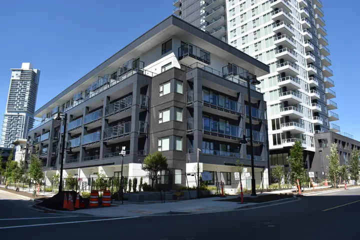 Jinju: high-rise exterior cladding in Coquitlam, BC by L2 Group — ACM & cementitious panels