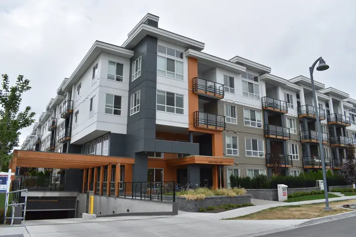 Lot 3: mid-rise exterior cladding in Tsawwassen, BC by L2 Group — Cementitious panels & Longboard