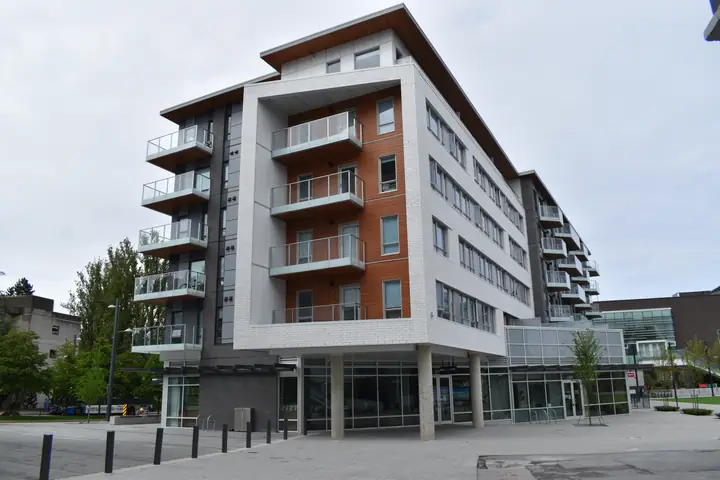 Lot D: mid-rise exterior cladding in Vancouver, BC by L2 Group — Longboard & cementitious board